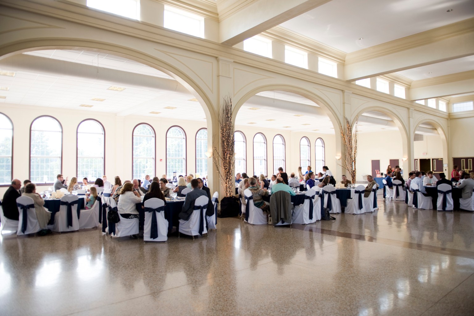 Schindler Banquet Hall set with round tables for a dinner event