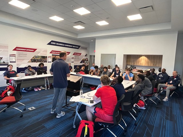 Group meeting at tables in a Fieldhouse conference room